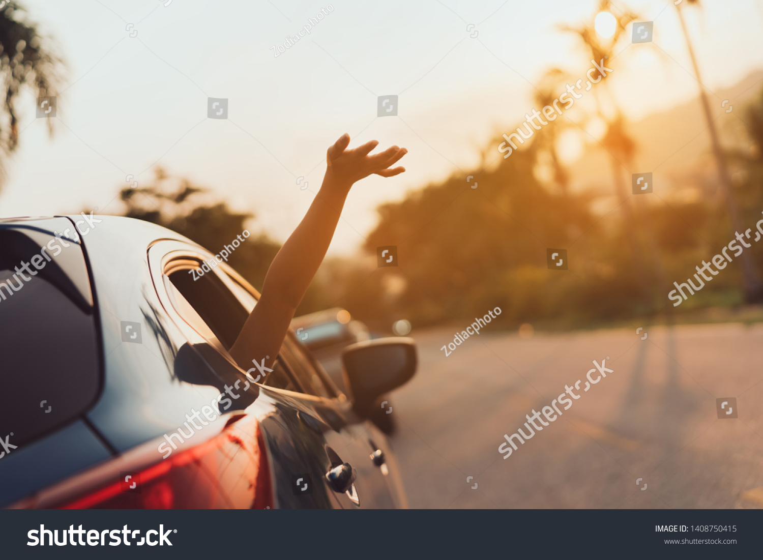 Hatchback Car travel driving road trip of woman summer vacation in blue car at sunset,Girls happy traveling enjoy holidays and relaxation with friends together get the atmosphere and go to destination #1408750415