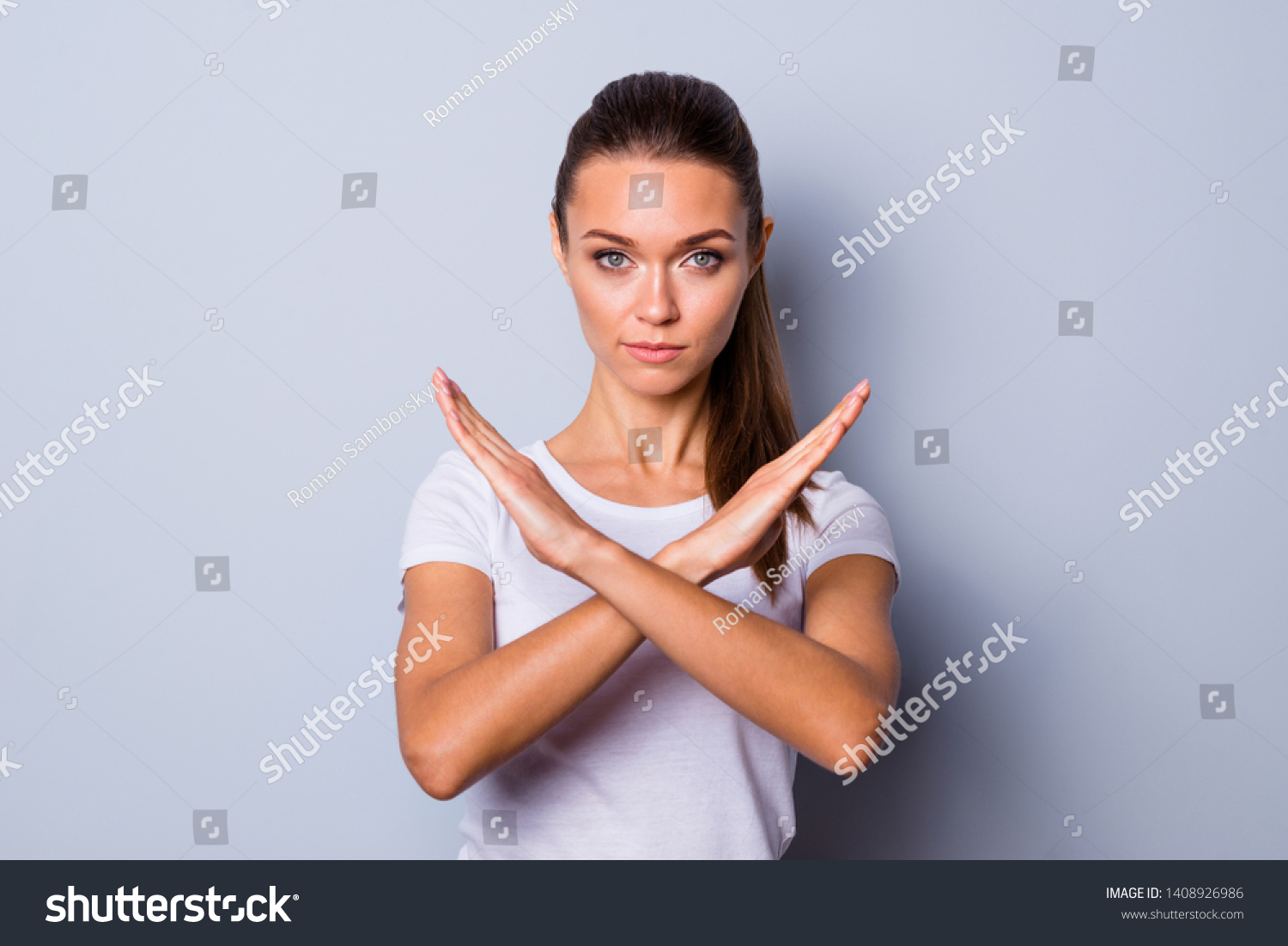 Close up photo amazing beautiful she her lady pretty hairstyle arms hands fingers palms crossed not allow violence stop war make love calling wear casual white t-shirt clothes isolated grey background #1408926986