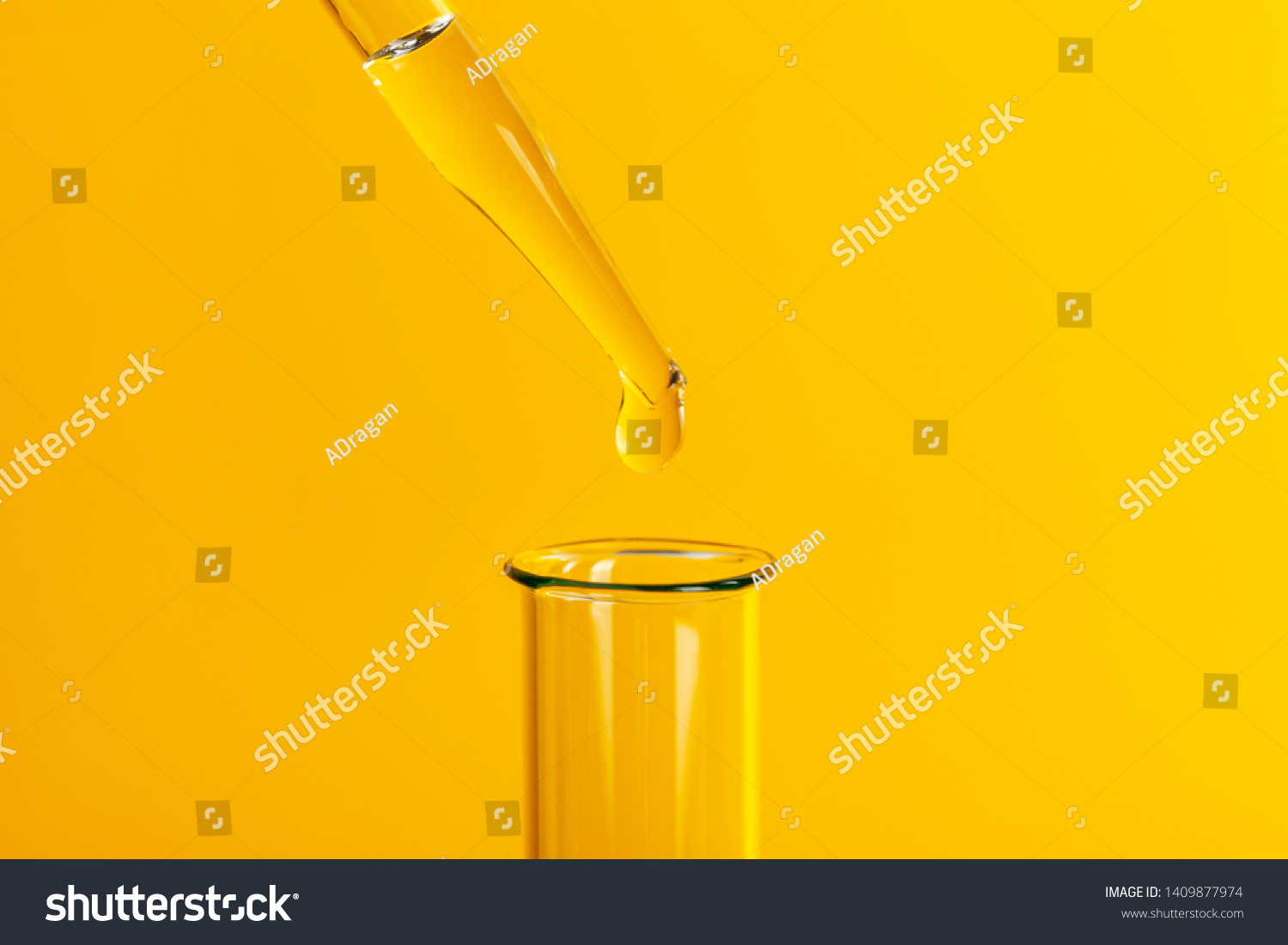 Drop the pipette into the test tube. The study of biological material. Laboratory research. Yellow background #1409877974
