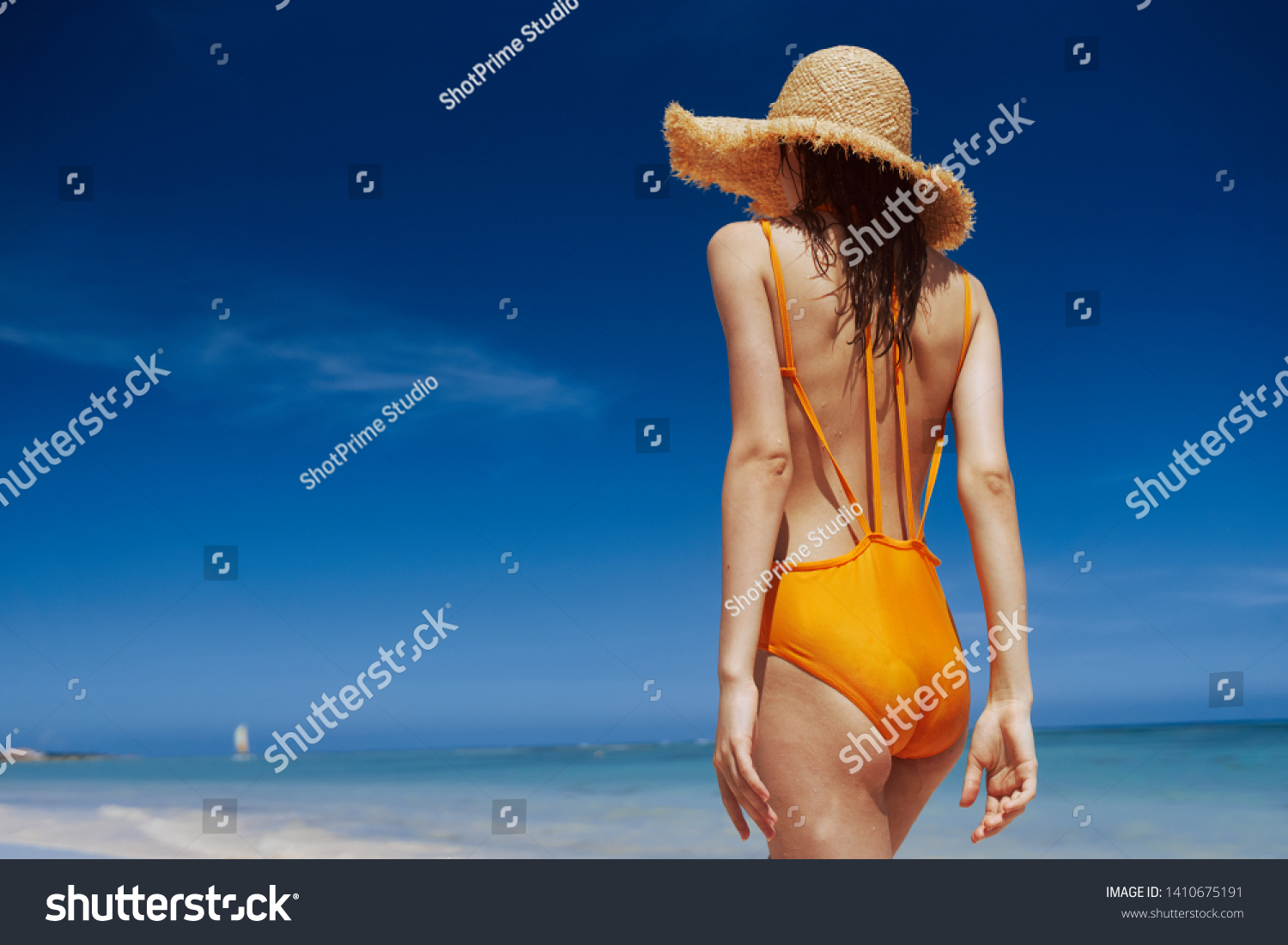 Pretty woman in a yellow swimsuit nature vacation travel vacation leisure lifestyle Relax sun tan bikini tropics #1410675191