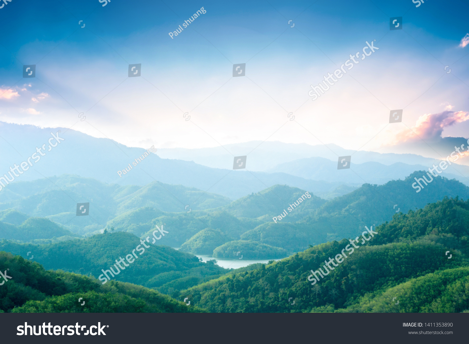 World Environment Day concept: Green mountains and beautiful sky clouds under the blue sky #1411353890