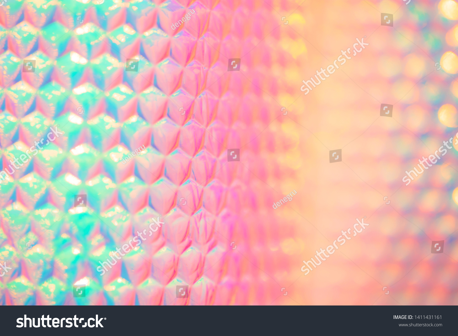 Holographic 90s retro rainbow neon candy colored abstract wallpaper background texture with smooth geometric pattern #1411431161