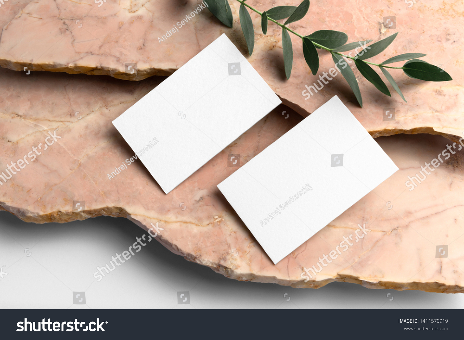 Real photo, business cards branding mockup template, isolated on light grey background, with marble and floral elements to place your design. #1411570919