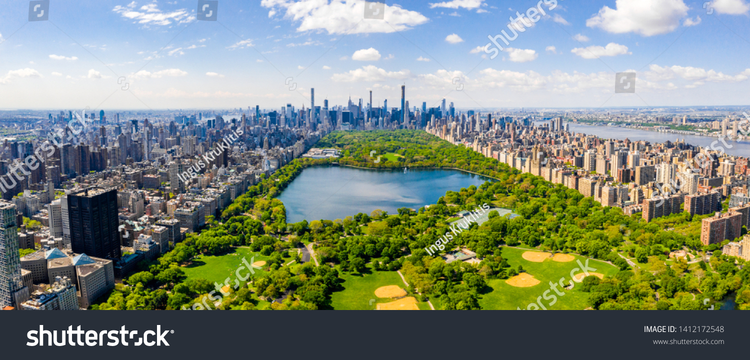 Central Park aerial view, Manhattan, New York. Park is surrounded by skyscraper. Beautiful view of the Jacqueline Kennedy Onassis Reservoir in the center of the park. #1412172548