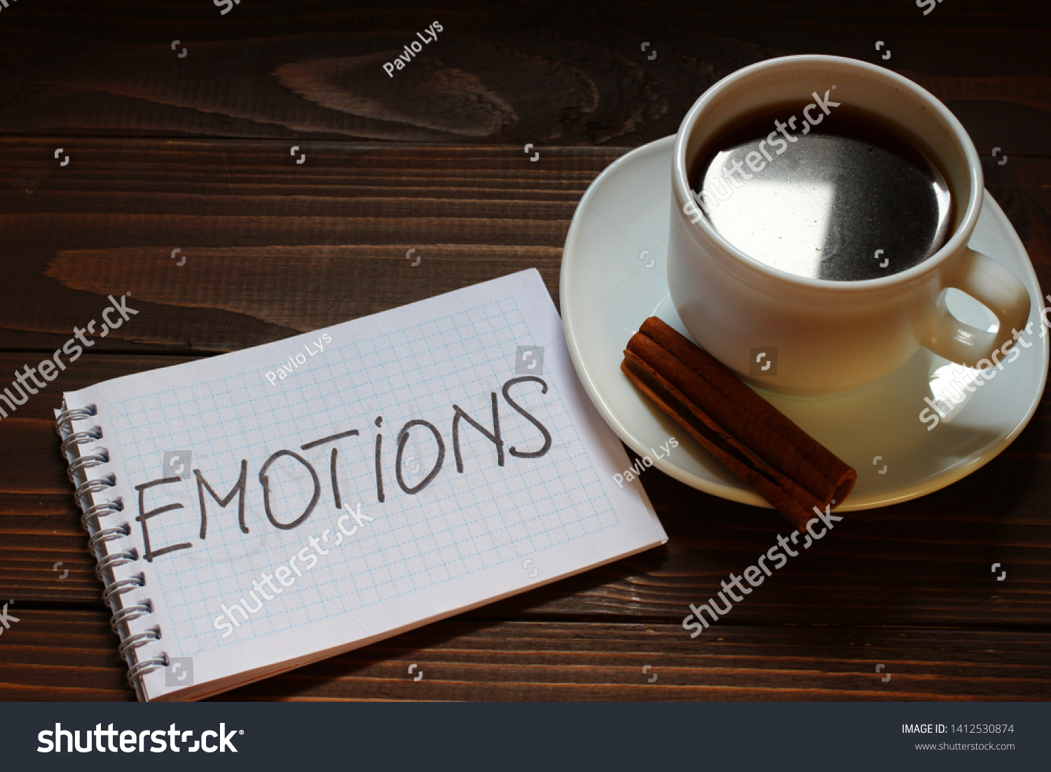 Emotions inscription and word in a notebook near a cup of coffee #1412530874