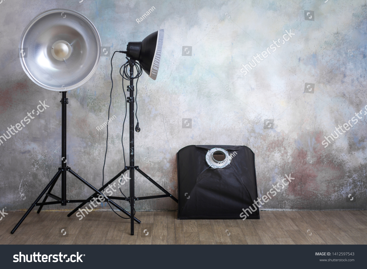 Professional lighting equipment in the photo studio on the original gray background, minimalist interior and lighting equipment #1412597543