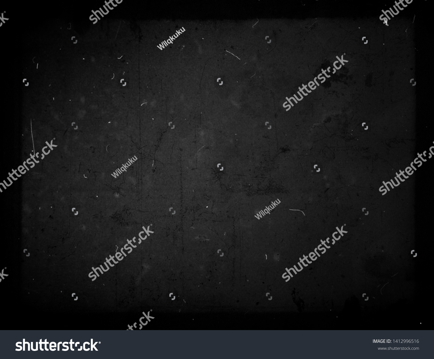 Black grunge scratched background, old film effect, scary dusty texture #1412996516