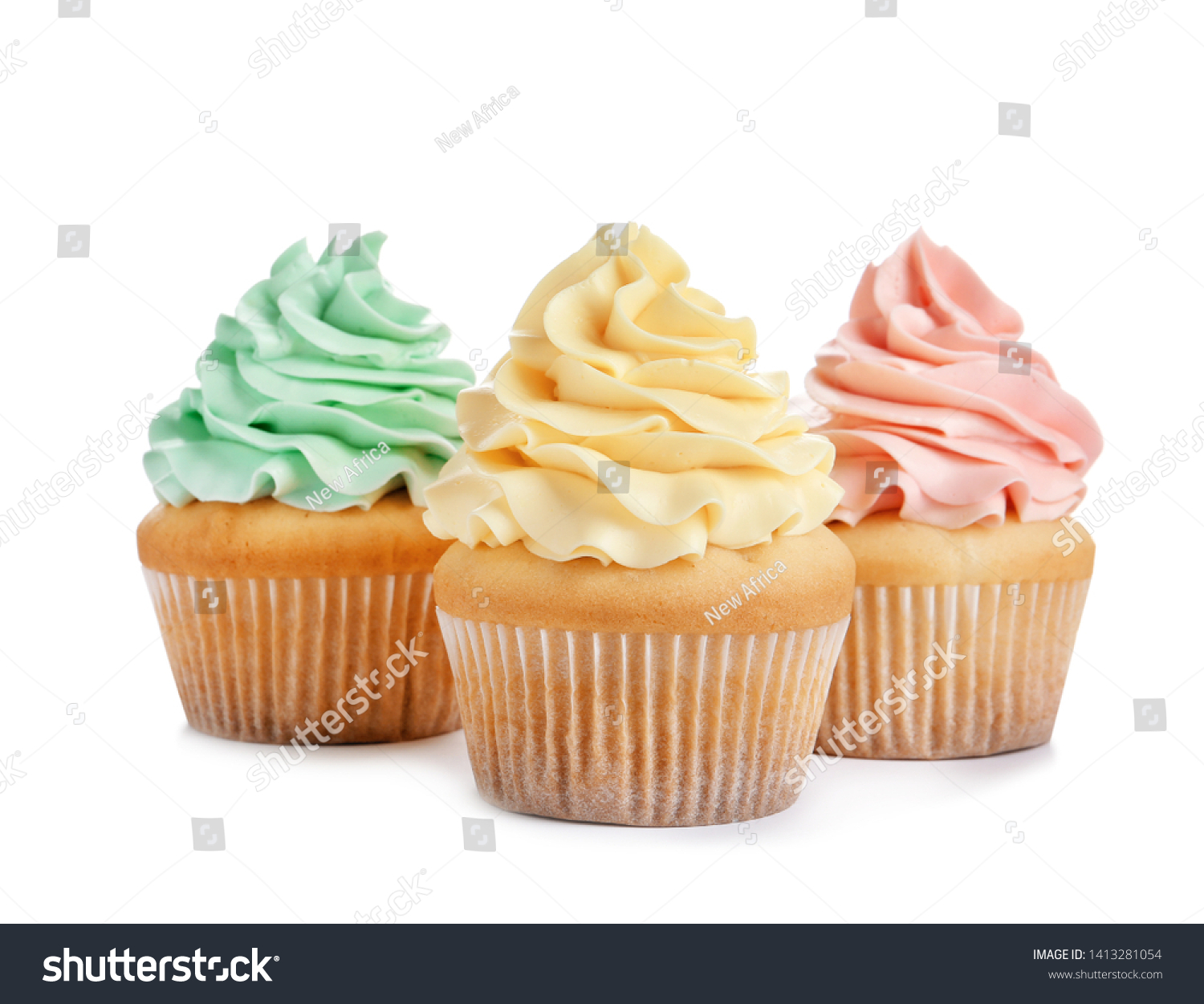 Delicious cupcakes with cream on white background #1413281054