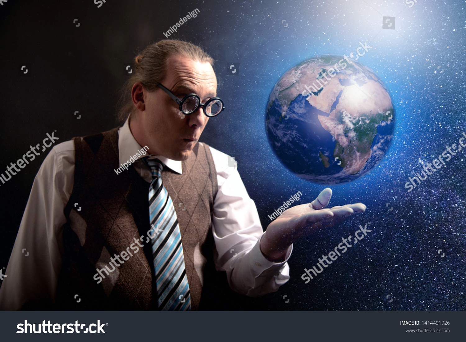Funny scientist looking to universe and planet earth #1414491926