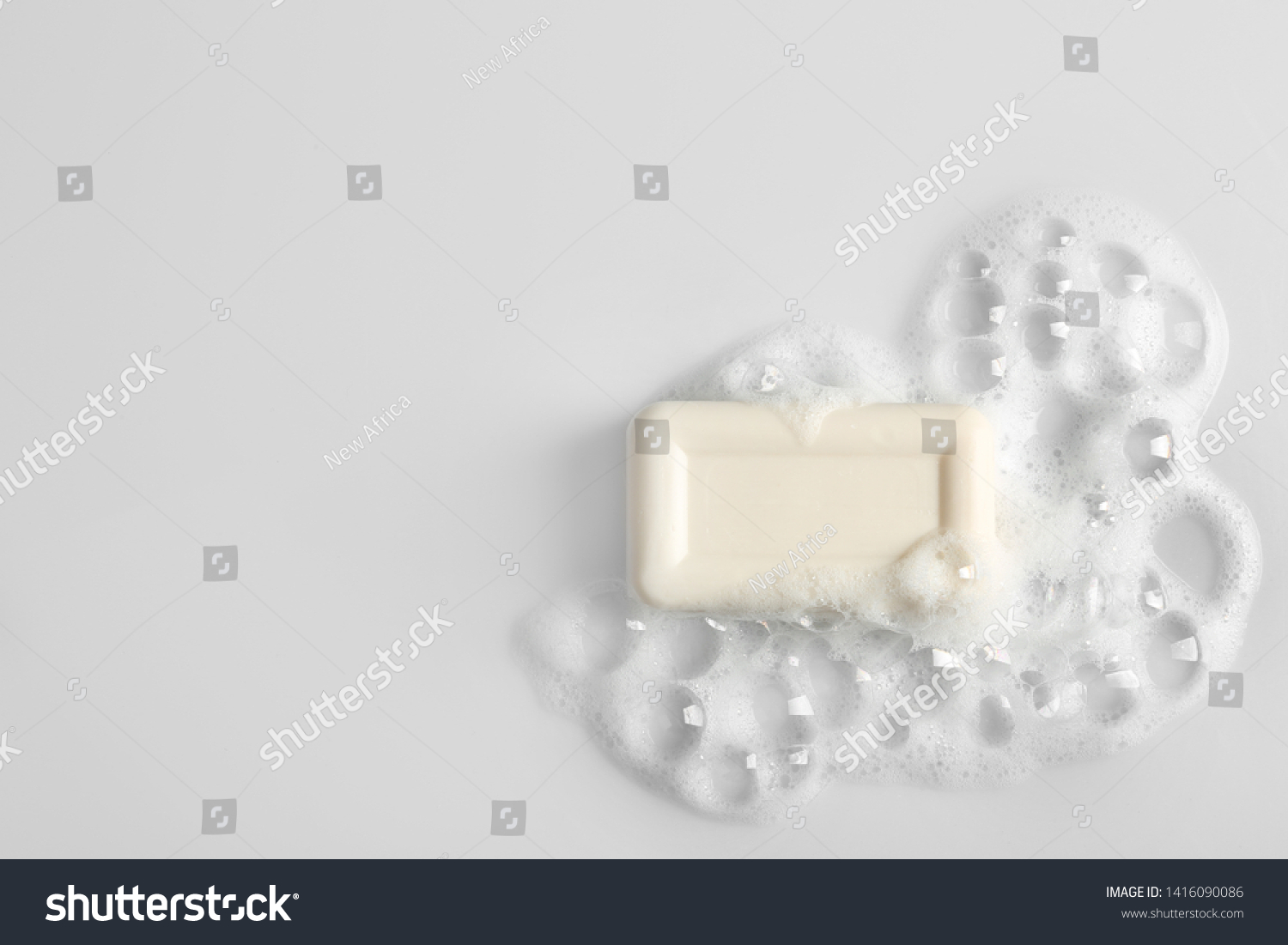 Soap bar and foam on white background, top view. Mockup for design #1416090086