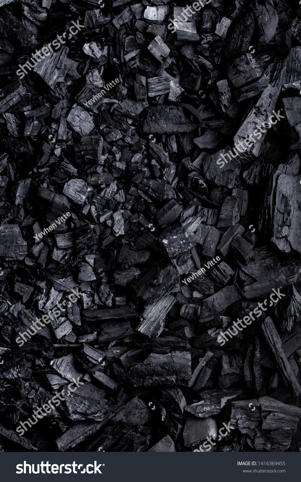 Flat lay of coal mineral black stones background. Coal pattern studio background #1416369455