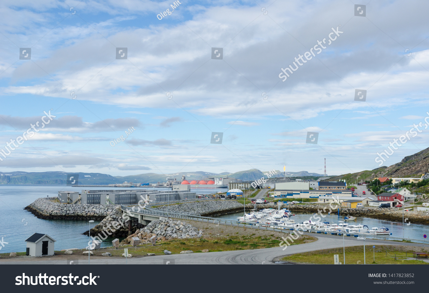 Marina, storages, gas carrier and flare stack in the harbor of Hammerfest #1417823852