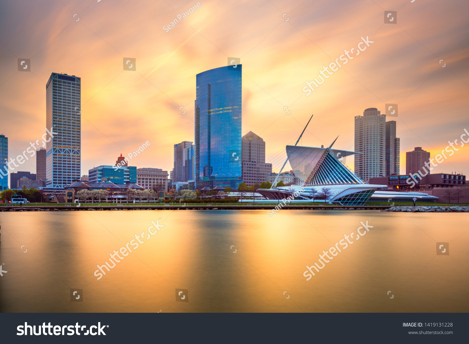 Milwaukee, Wisconsin, USA downtown city skyline on Lake Michigan at twilight.  #1419131228