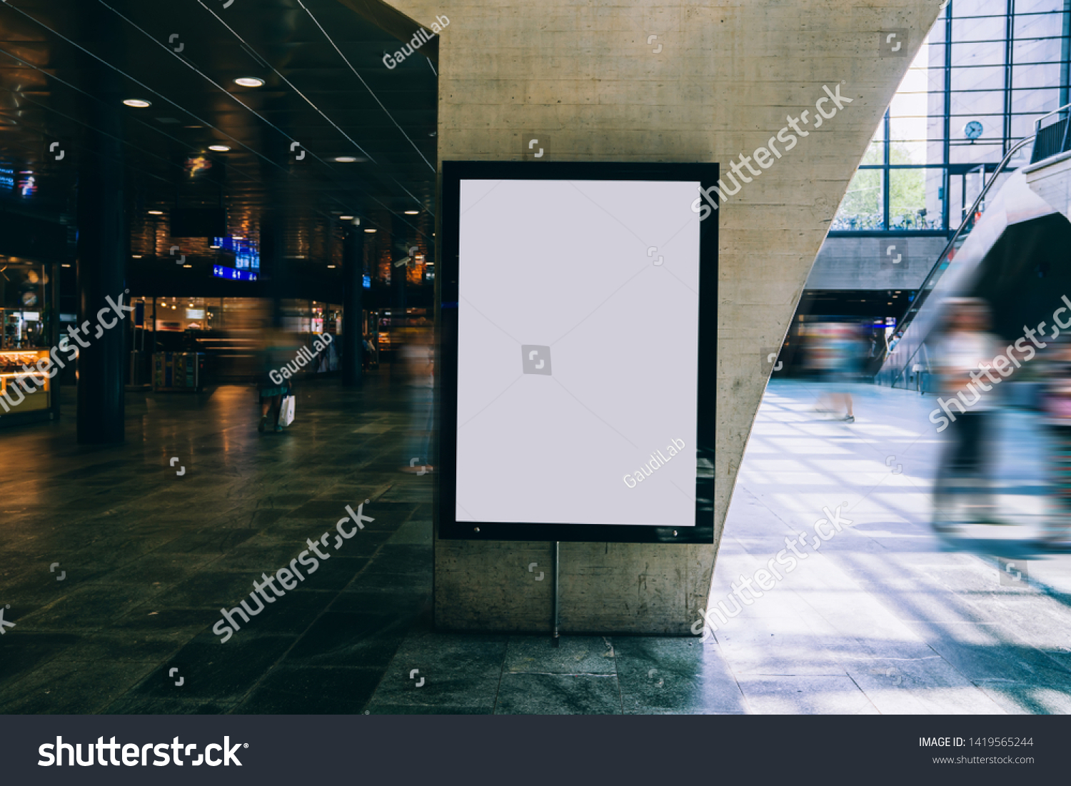 Clear Billboard in public place with blank copy space screen for advertising or promotional poster content, empty mock up Lightbox for information, blank display in station area with daylight #1419565244