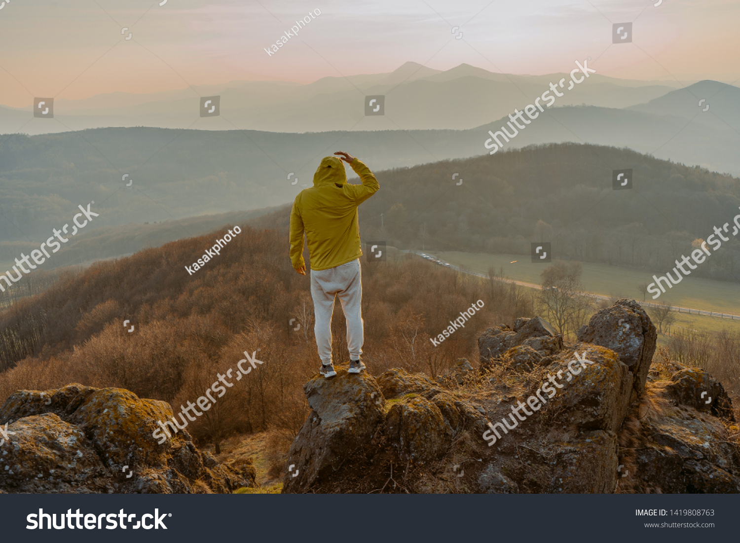
Traveler relax on the edge rock. Nature and adventure composition. Sharp exposed sandstone hills. Leisure activity. Sport tourism. Adventures of hikers #1419808763