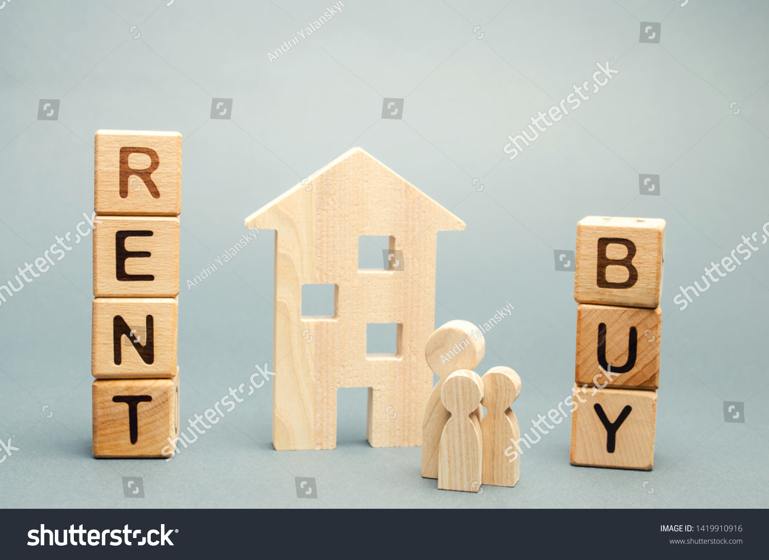 Wooden blocks with the word Rent or buy and a family stands near the house. Make the right decision. Real estate concept. Rent apartment. Property. Rental, renting home. Buying. Purchase housing #1419910916