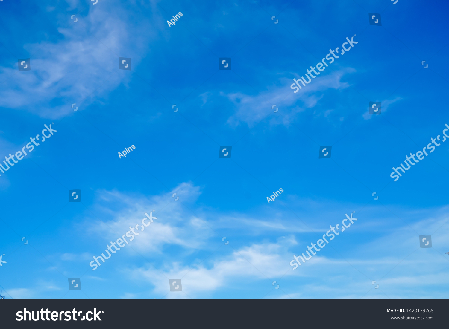 fluffy and softness white clouds floating on shade of blue sky in sunshine day #1420139768