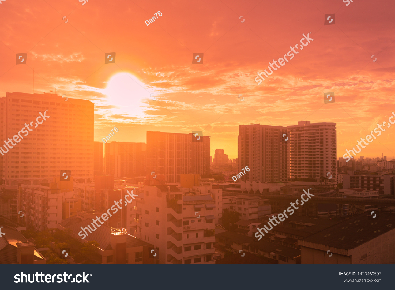 Golden light sunset or sunrise in summer Bangkok city Thailand, Hot weather image #1420460597