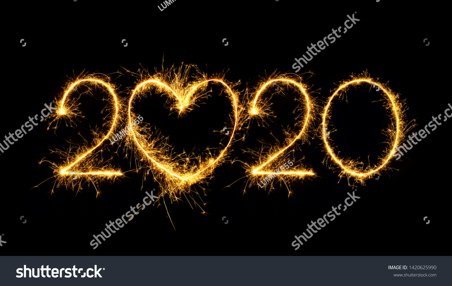 Happy New Year 2020. Creative Number 2020 with sign heart written sparkling sparklers isolated on black background for design. Beautiful Glowing overlay template for holiday greeting card. #1420625990