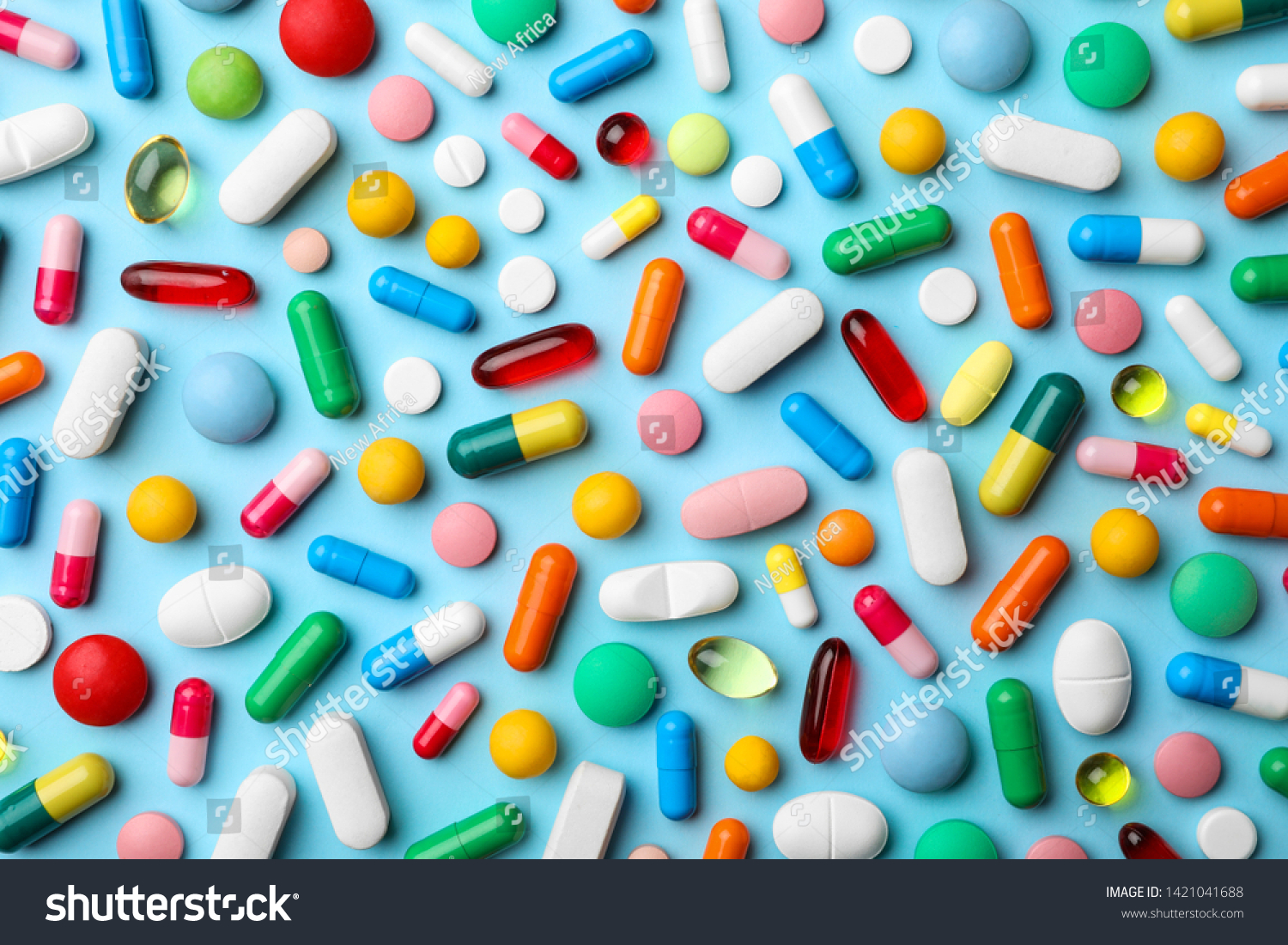 Different pills on color background, flat lay #1421041688