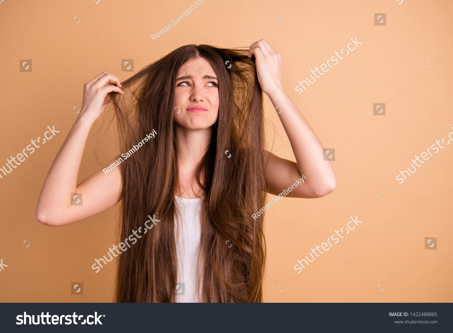 Close-up portrait of her she nice-looking attractive displeased miserable lady showing despair repair loose lose loss alopecia mess hair disaster isolated on beige pastel background #1422488885