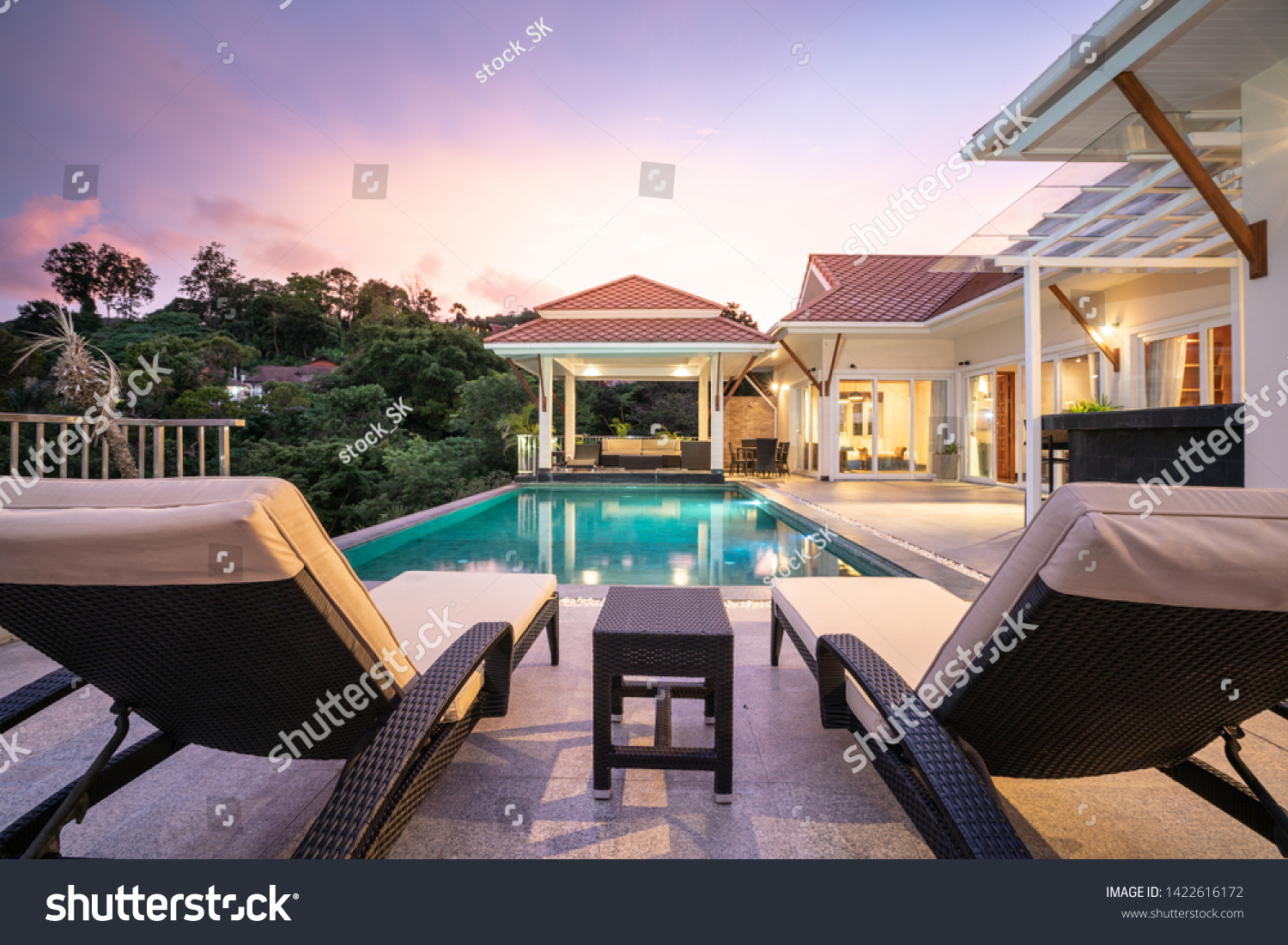 home or house Exterior design showing tropical pool villa with sun bed #1422616172