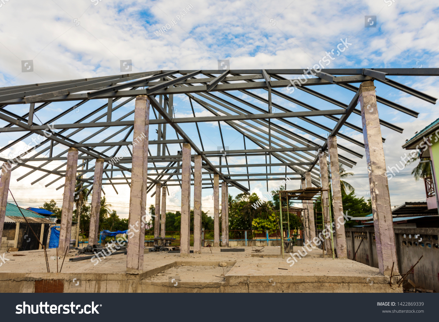 Structure of houses, pillars and concrete floors, roof structures using steel in construction #1422869339