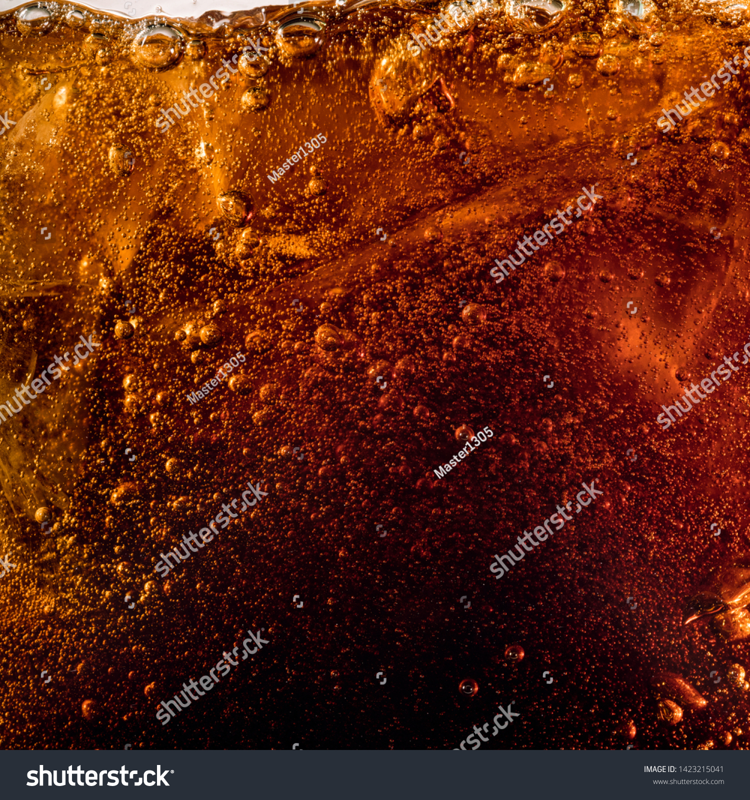 Close up view of the ice cubes in dark cola background. Texture of cooling sweet summer's drink with foam and macro bubbles on the glass wall. Fizzing or floating up to top of surface. #1423215041