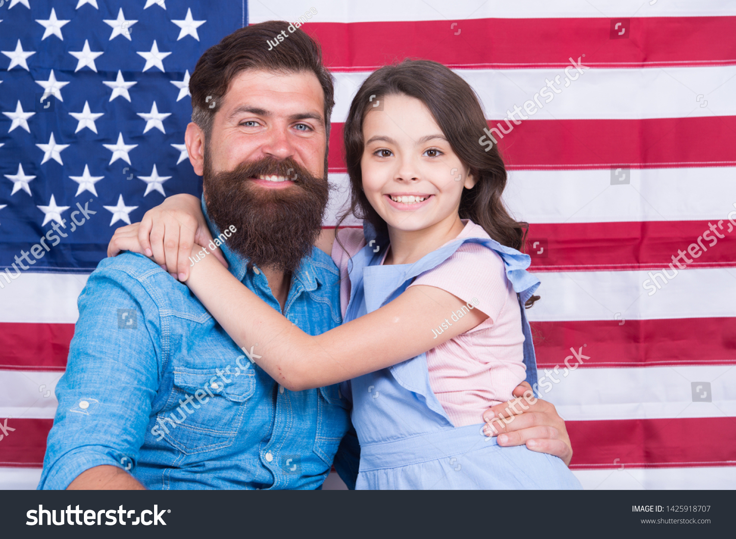 Patriotismt begins at home. Patriotic family showing patriotism on american flag decor. American patriotism. Patriotism and love for the homeland. Independence day. #1425918707