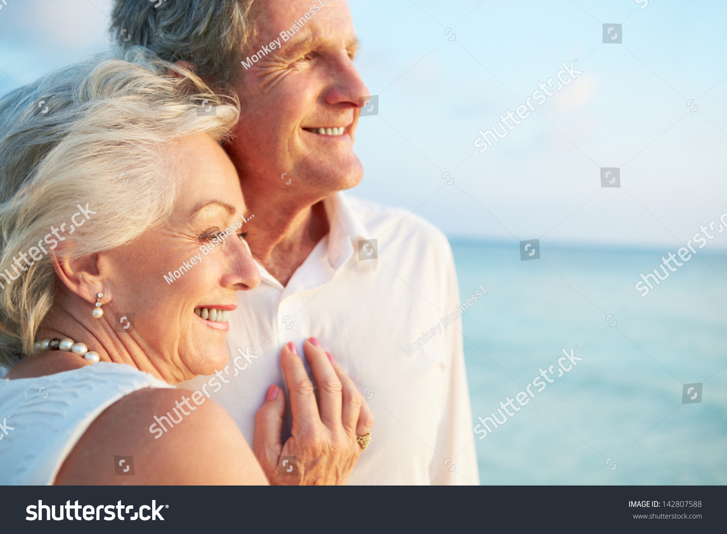 Senior Couple Getting Married In Beach Ceremony #142807588
