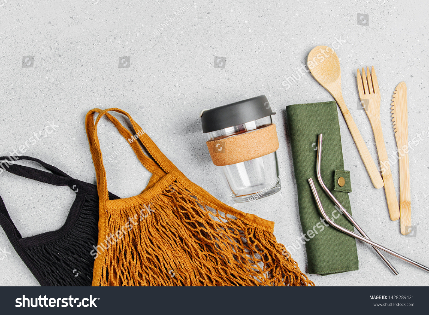 Set of Eco friendly bamboo cutlery, eco bag and reusable coffee mug. Sustainable lifestyle. Plastic free concept. #1428289421
