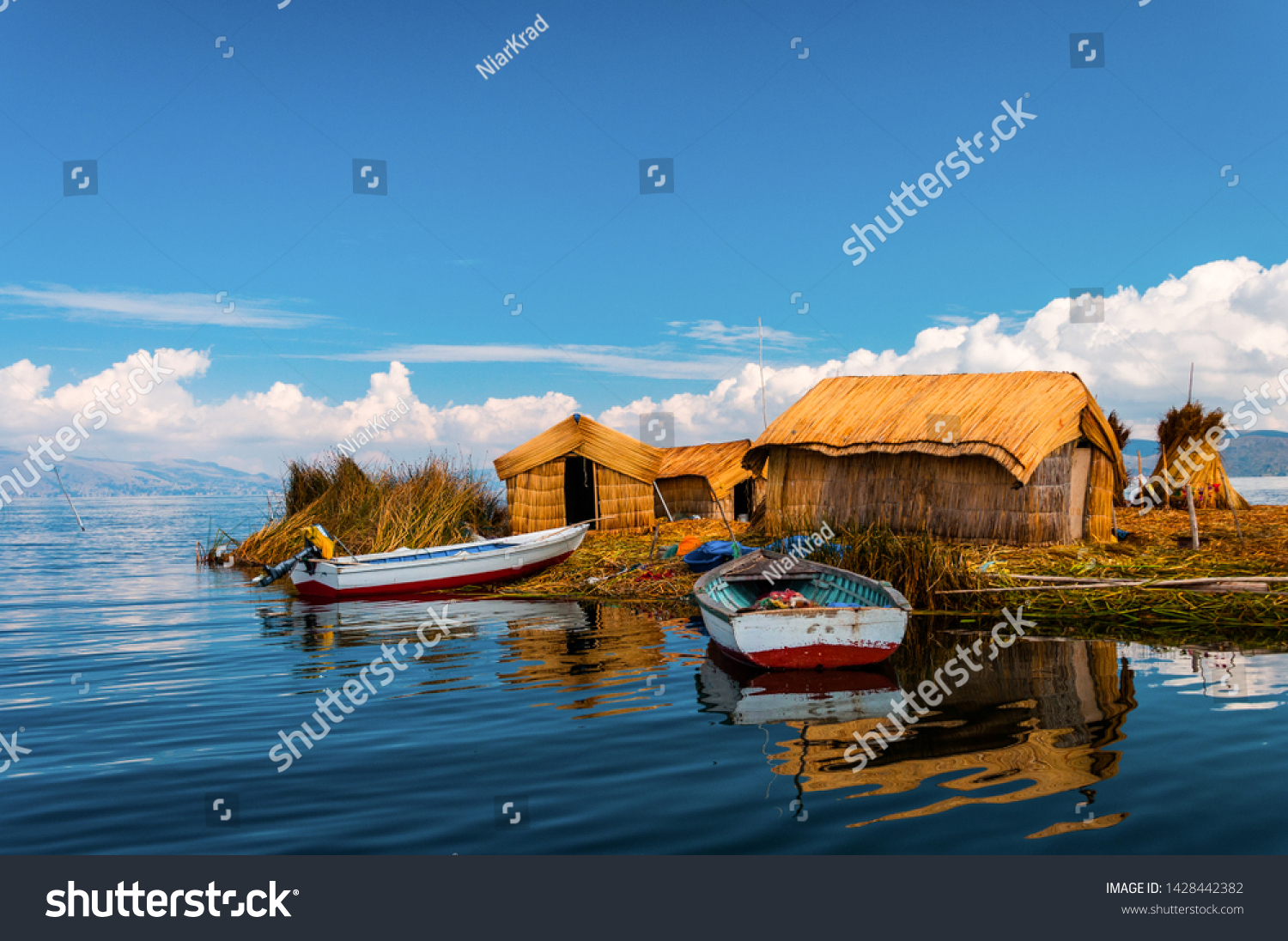 Uros Floating islands in Titikaka lake in the Border bttween Peru and Bolivia, Peru #1428442382