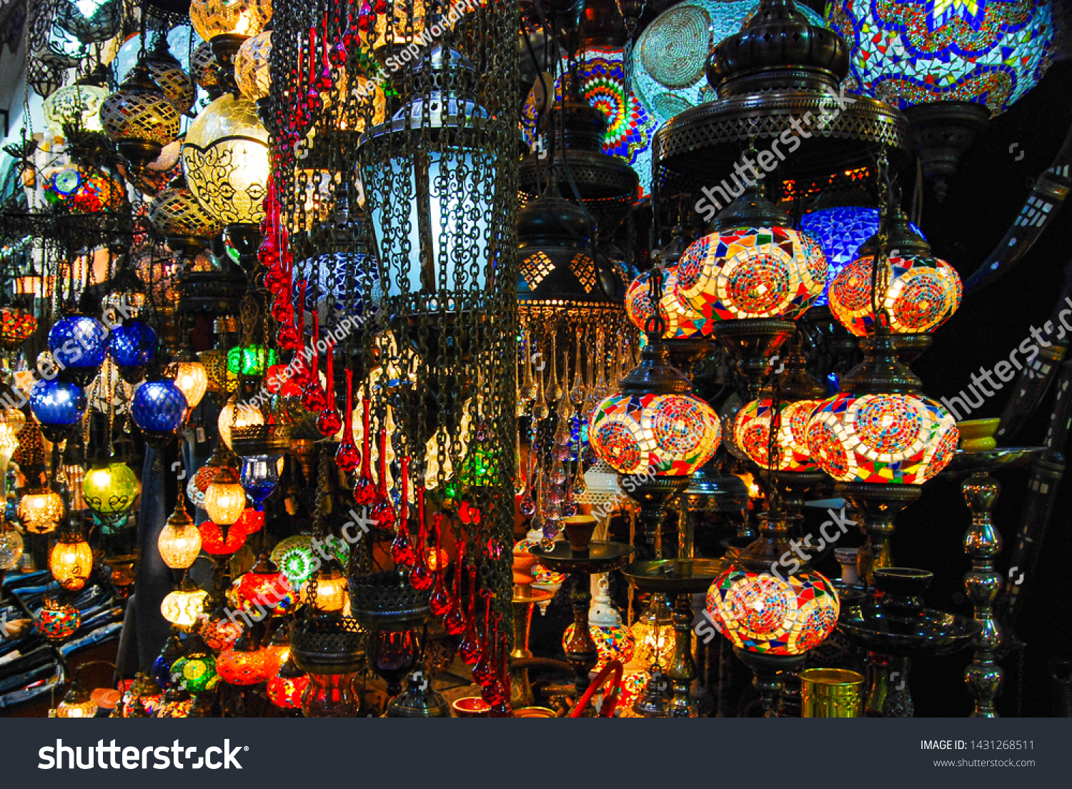 Beautiful Turkish lanterns in assortment of rich and bright colors shining brightly in a bazaar #1431268511