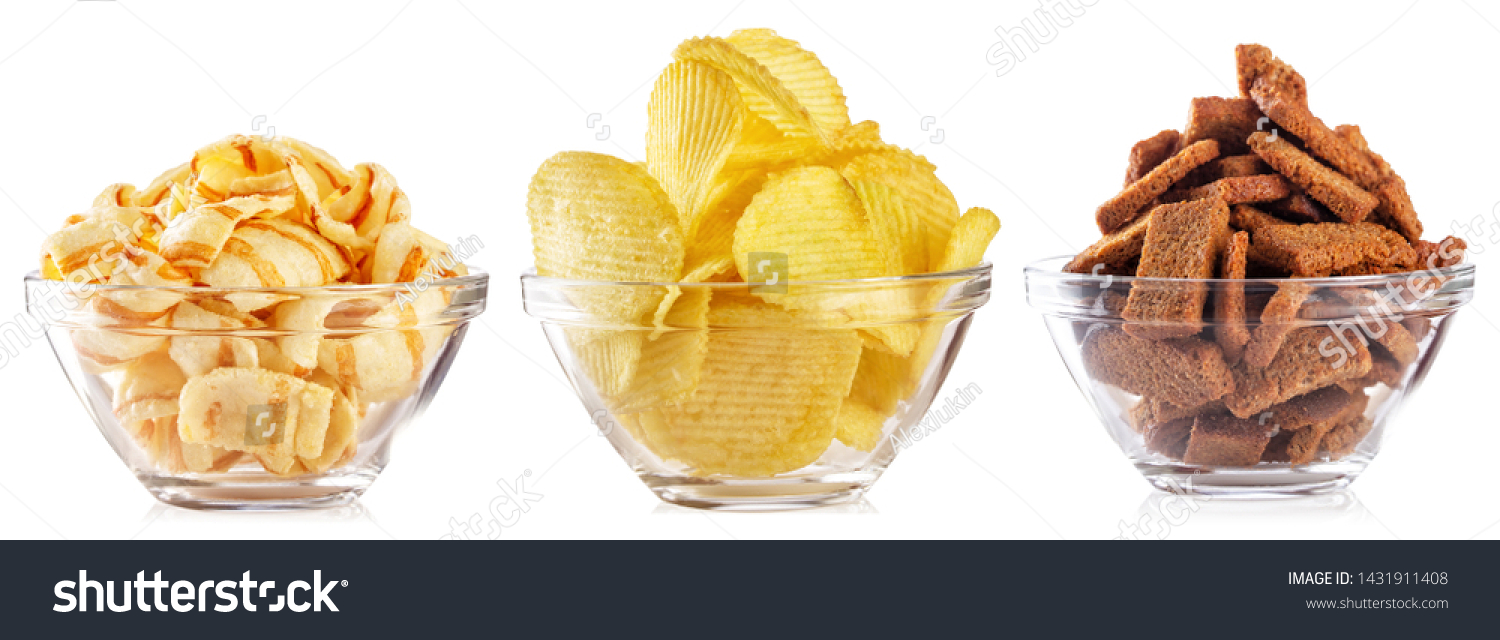 Collection of snacks for beer isolated on white background. Chips and crackers in a transparent plate. Set #1431911408