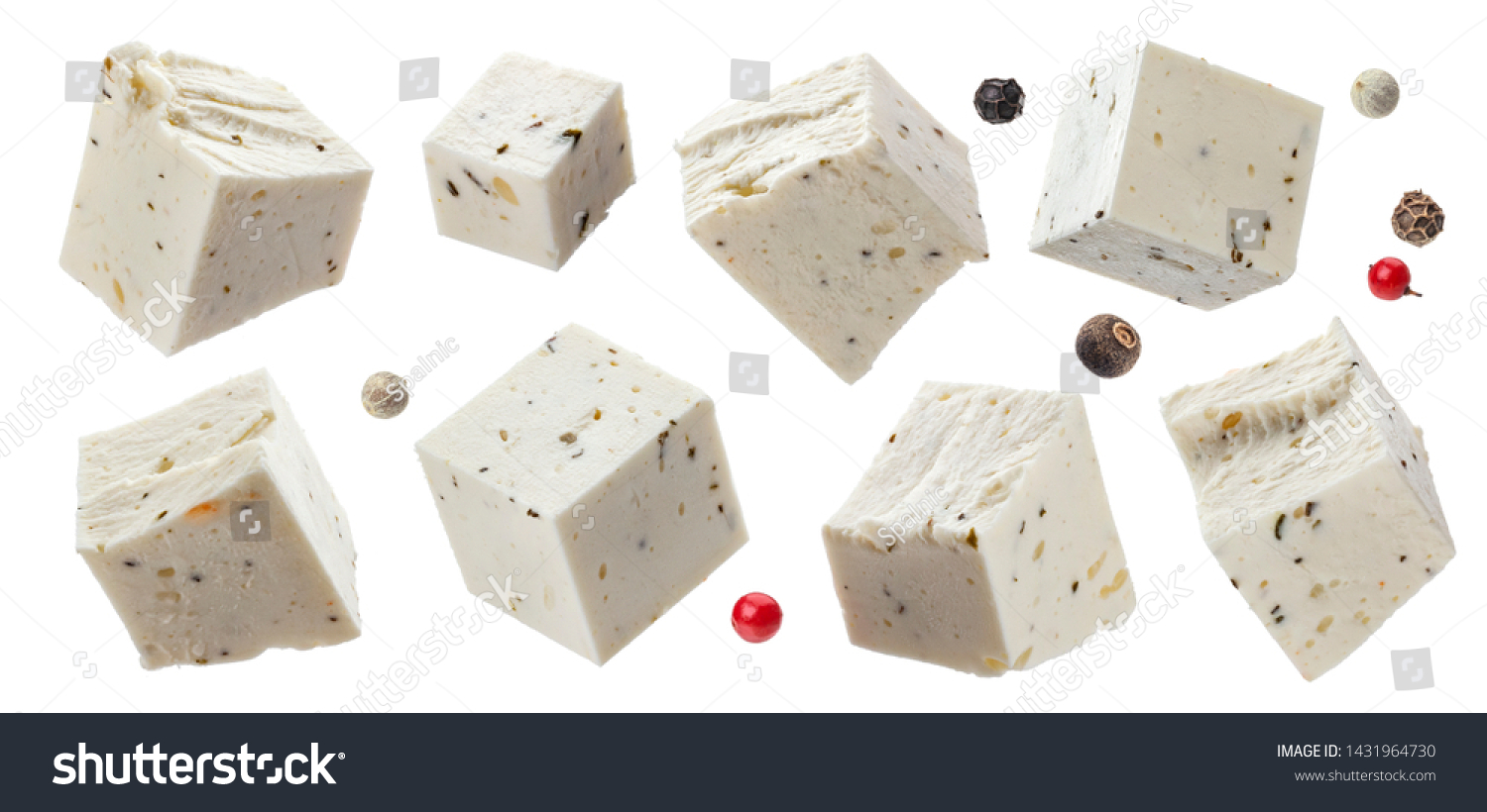 Greek feta cubes with herbs and spices, diced soft cheese isolated on white background with clipping path, collection #1431964730