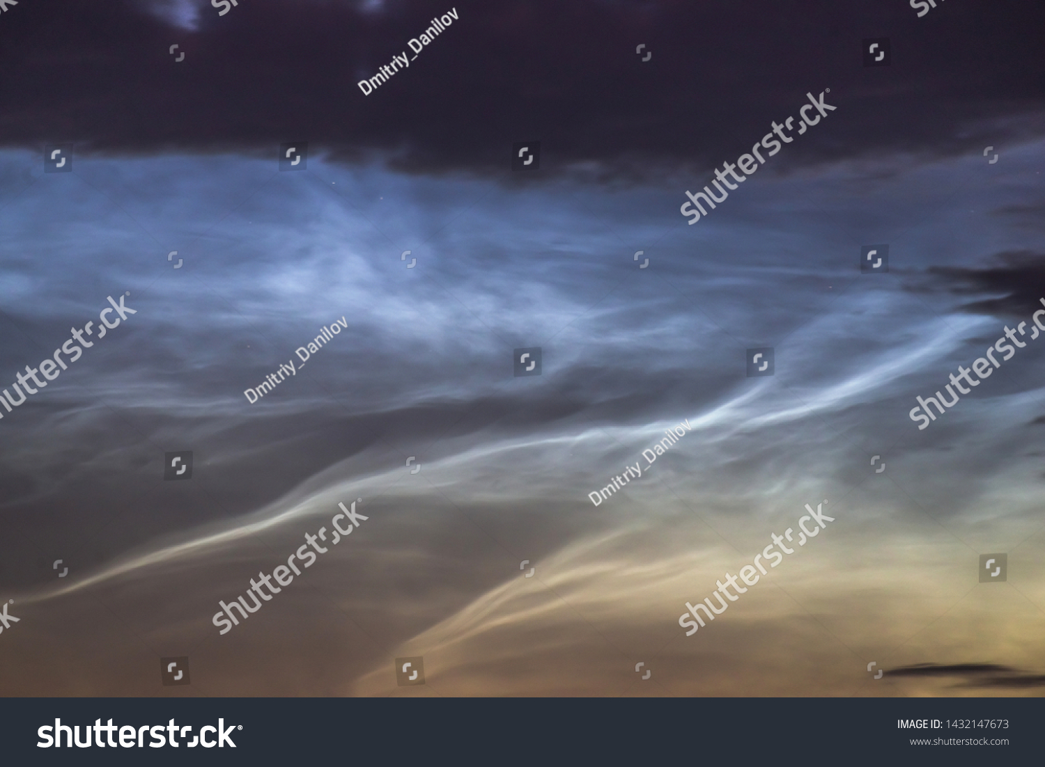 Noctilucent clouds closeup summer night. Rare atmospheric phenomenon #1432147673
