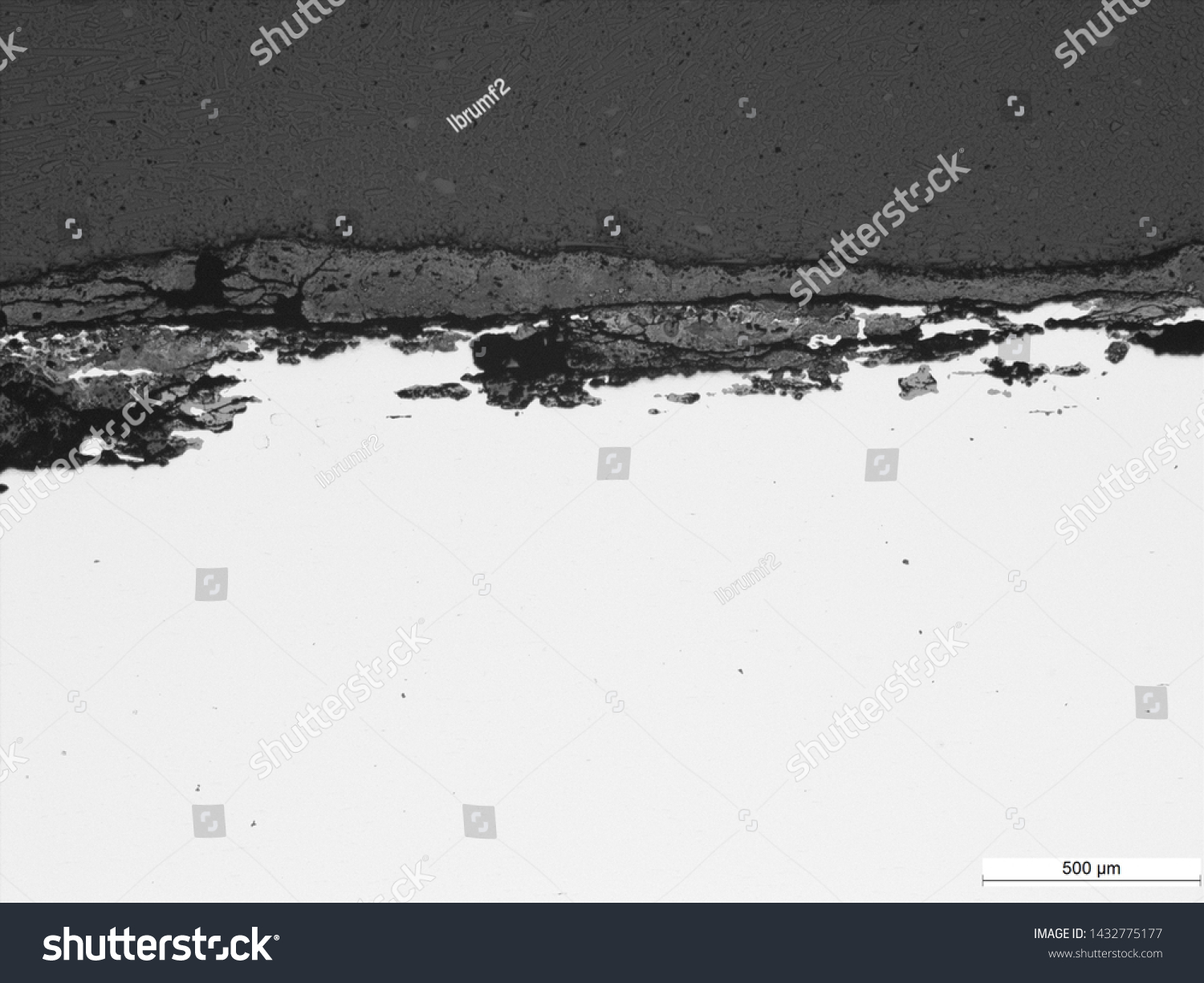 Corrosion and cracking of 2" carbon steel tubing, likely cause is stress corrosion cracking, micrographs #1432775177