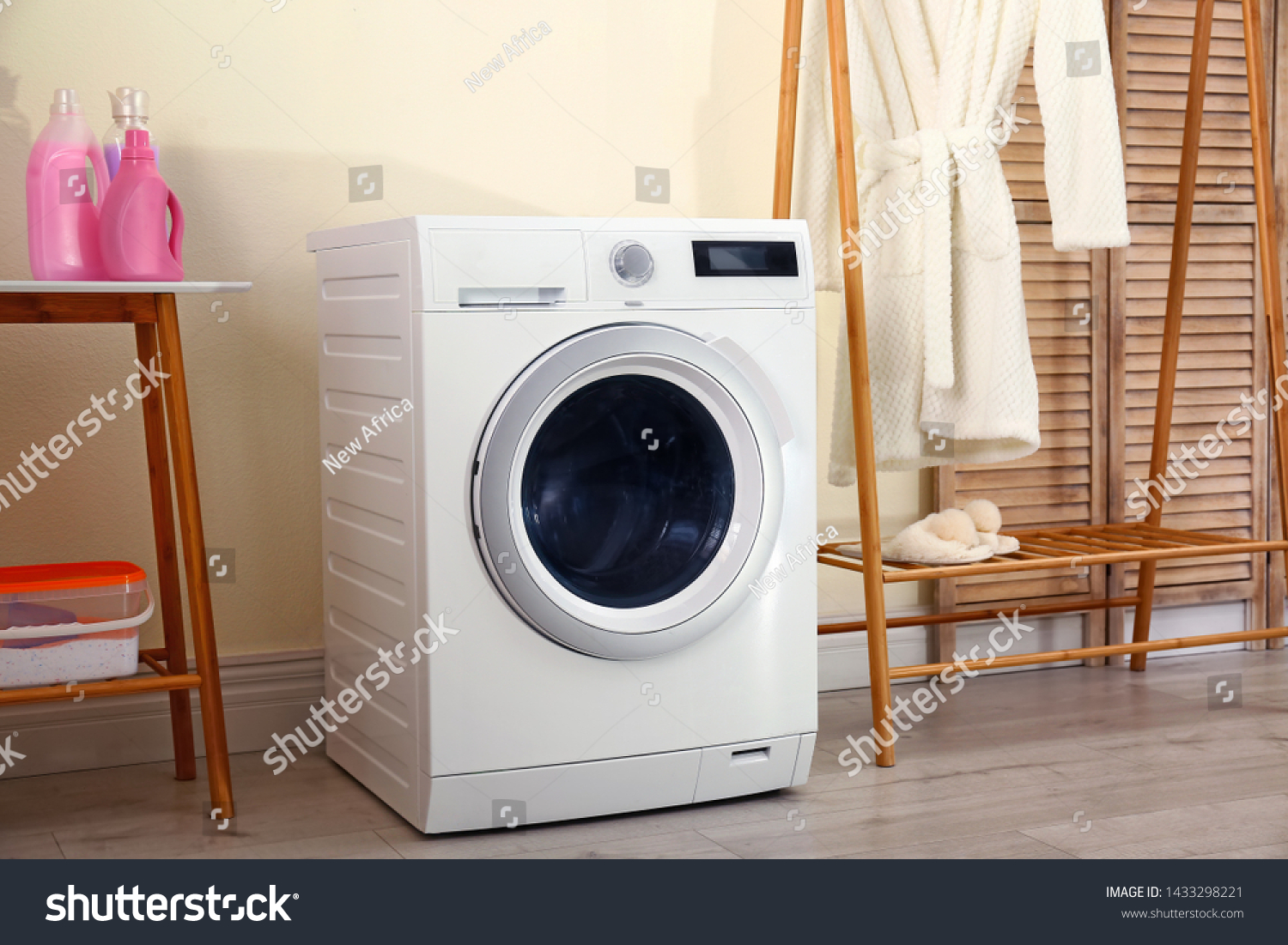 Laundry room interior with modern washing machine #1433298221