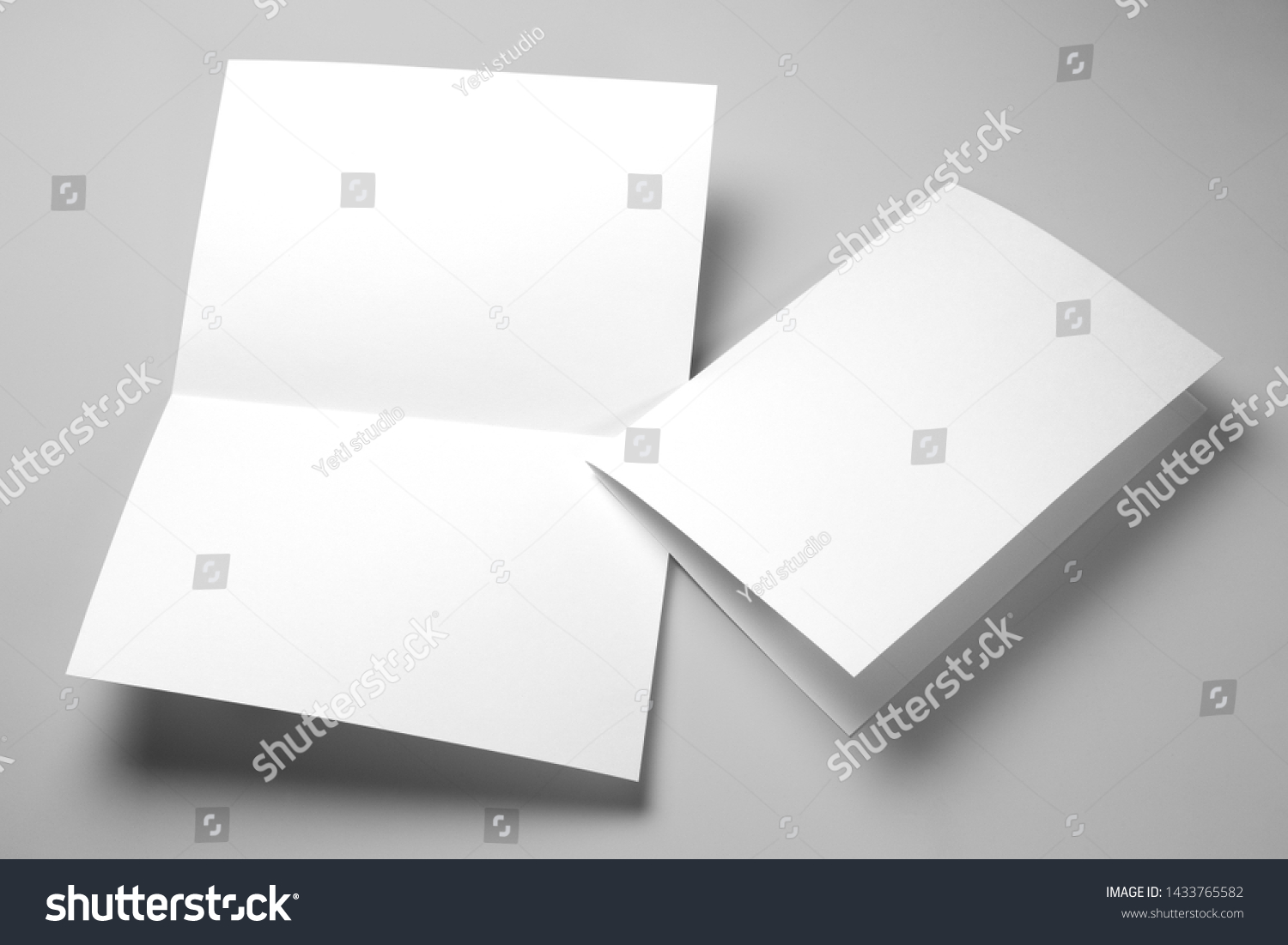 Blank half-folded booklet, postcard, flyer or brochure mockup template on gray background #1433765582