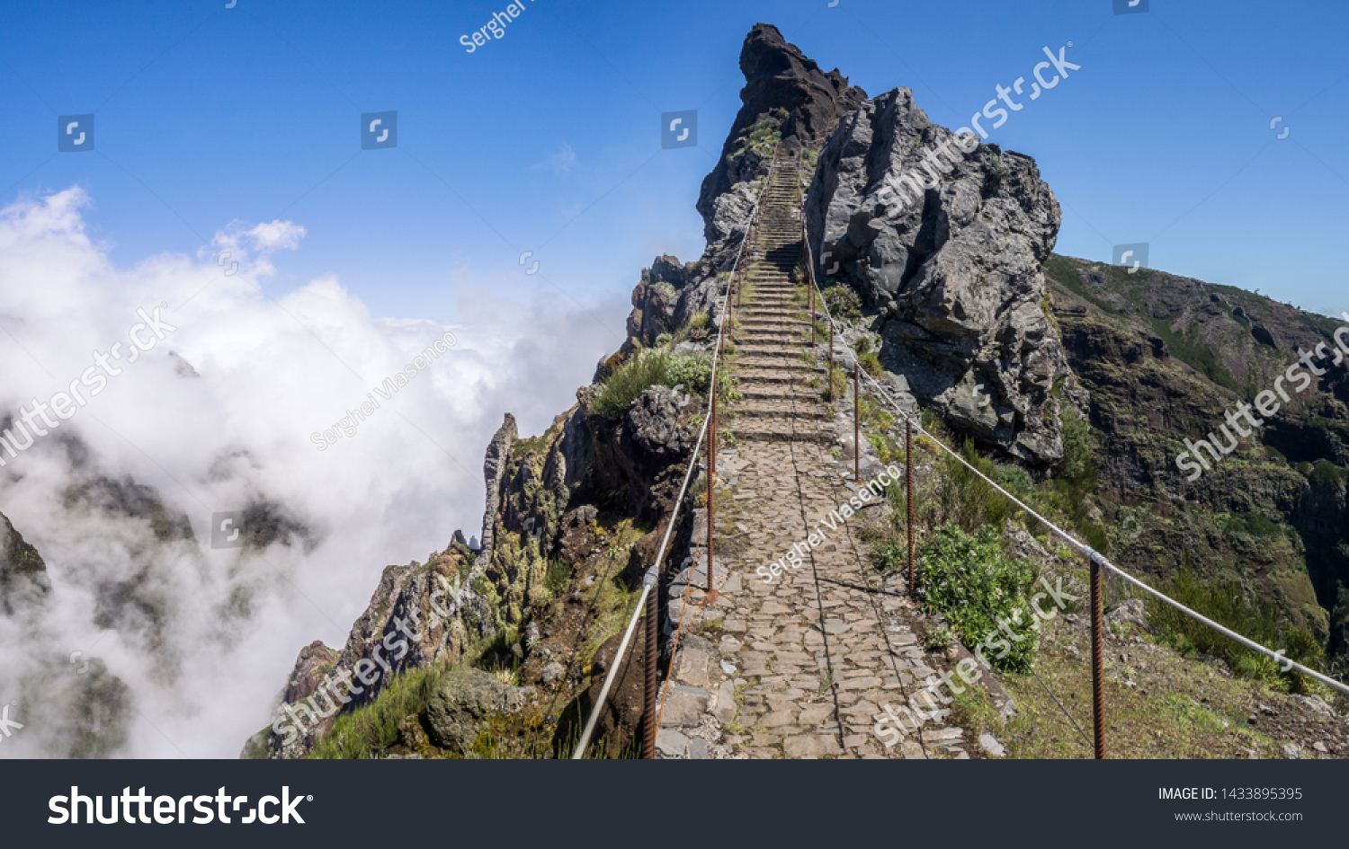 Hiking trail through inland mountains from the Pico de Ariero to Pico Ruivo. Madeira, Portugal. #1433895395