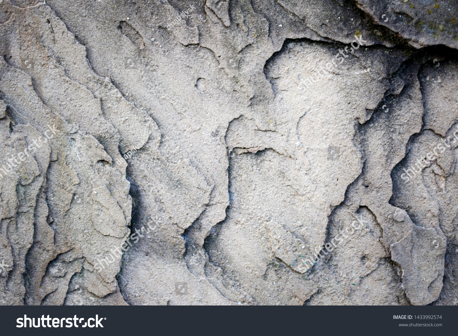 Abstract texture of stone wall of light gray and dark gray colors #1433992574