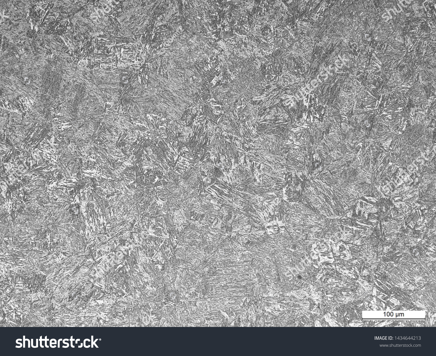 Microstructure of steel toe insert at carburized and non-carburized regions showing martensite and tempered martensite. Etched w/ 2% nital #1434644213