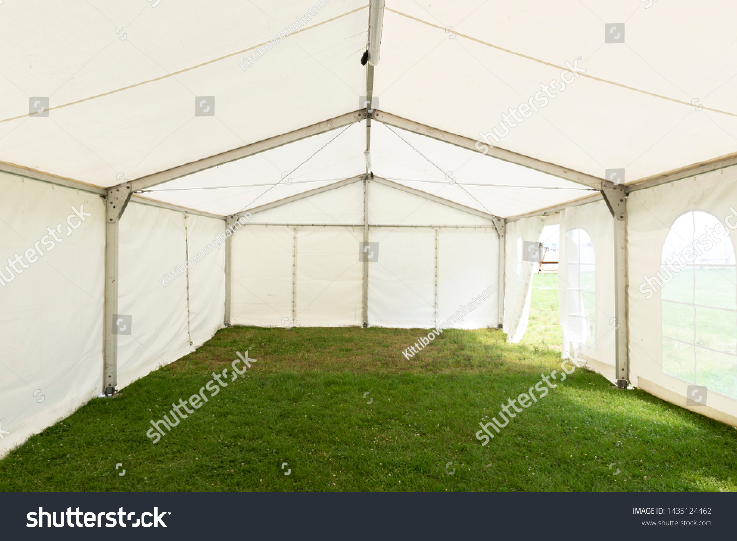 Inside empty white tent waiting for event arrangement #1435124462
