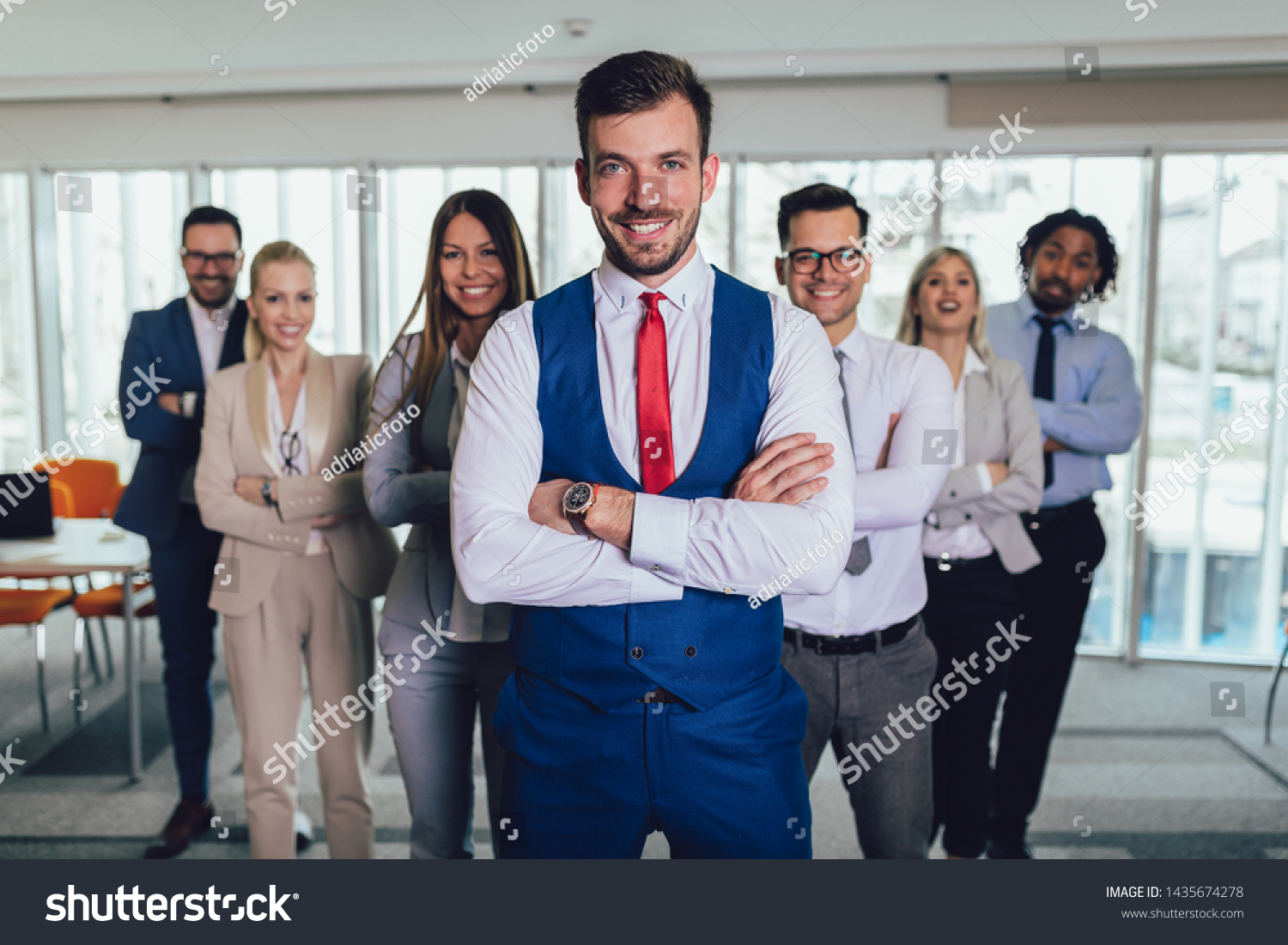 Group of happy business people and company staff in modern office, representig company.Selective focus. #1435674278