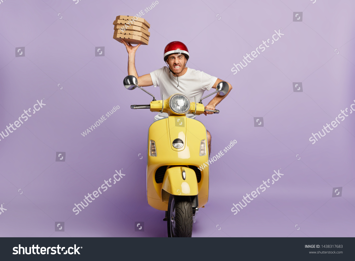 Food service, fast delivery concept. Impatient pizza delivery driver poses on fast motorbike, being in hurry with boxes of fast food, clenches teeth, annoyed with heavy traffic drives to customer home #1438317683