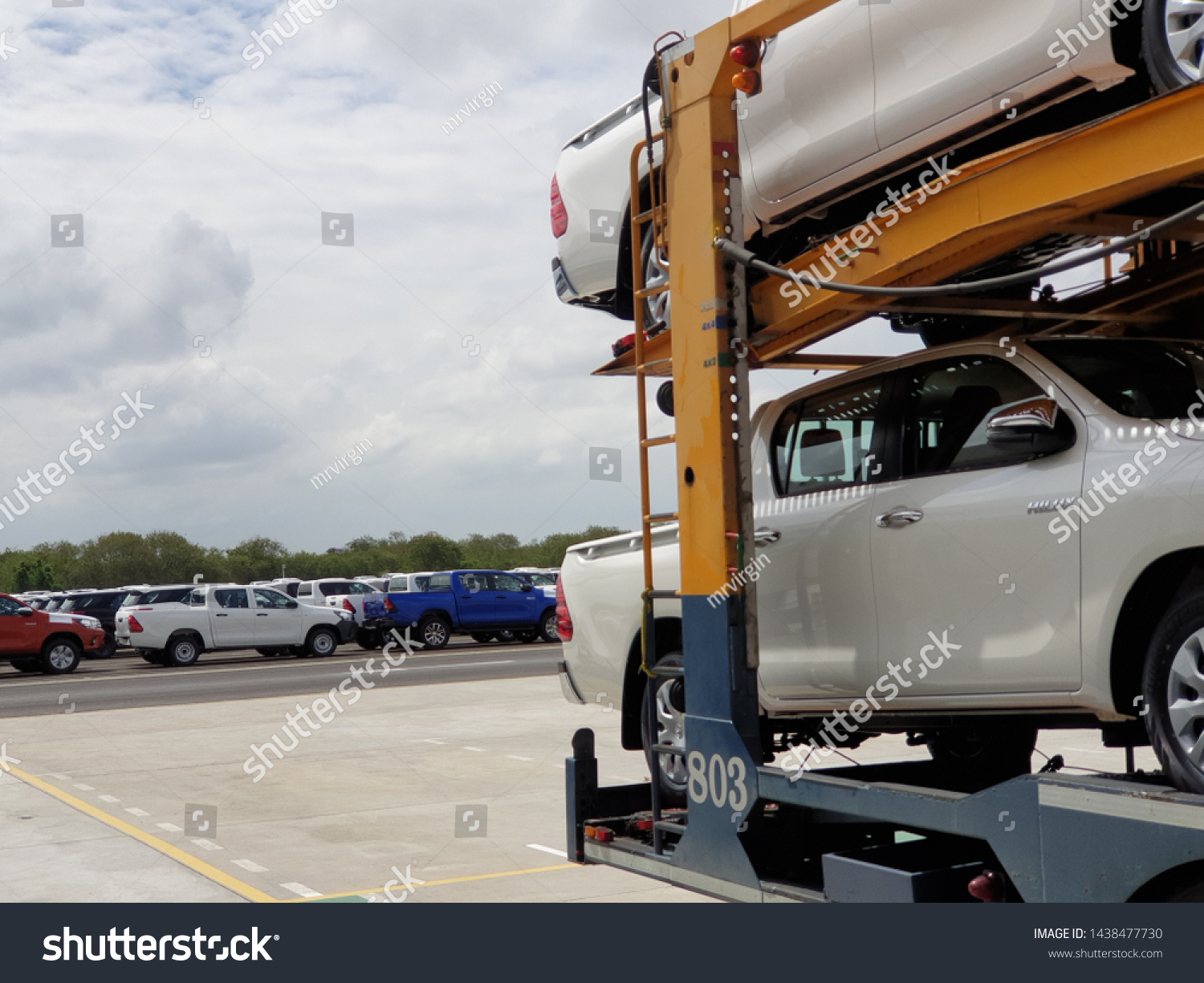 Chonburi, Thailand - July 1, 2019: New Toyota cars are parking in the yard and waiting to send to destination. Completed cars are waiting to move to destination. #1438477730