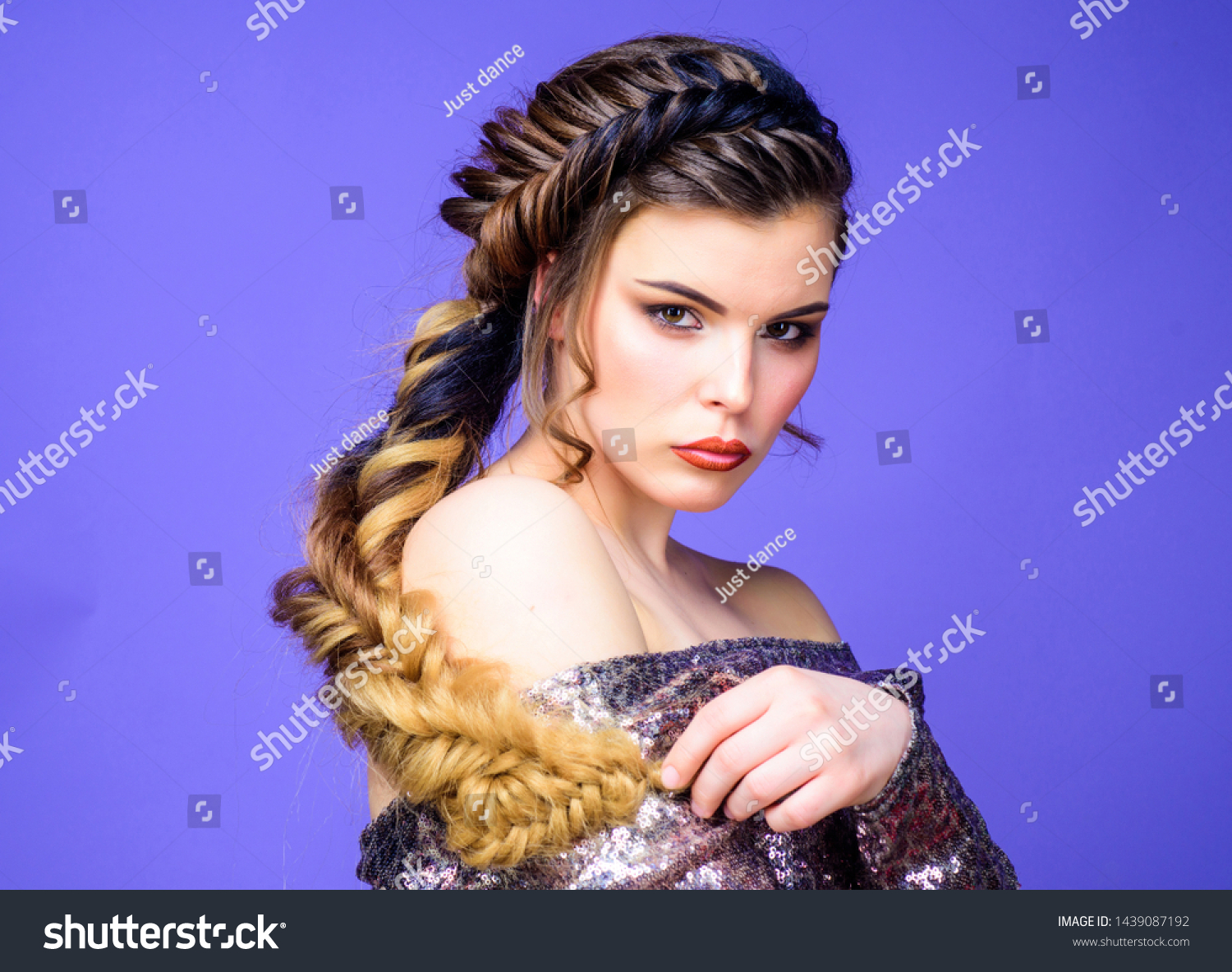 Beauty salon hairdresser art. Girl makeup face braided long hair. French braid. Professional hair care and creating hairstyle. Braided hairstyle. Beautiful young woman with modern hairstyle. #1439087192
