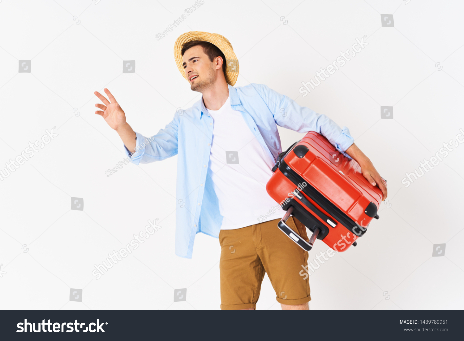 Handsome man with a red suitcase trip flight vacation joy leisure leisure #1439789951