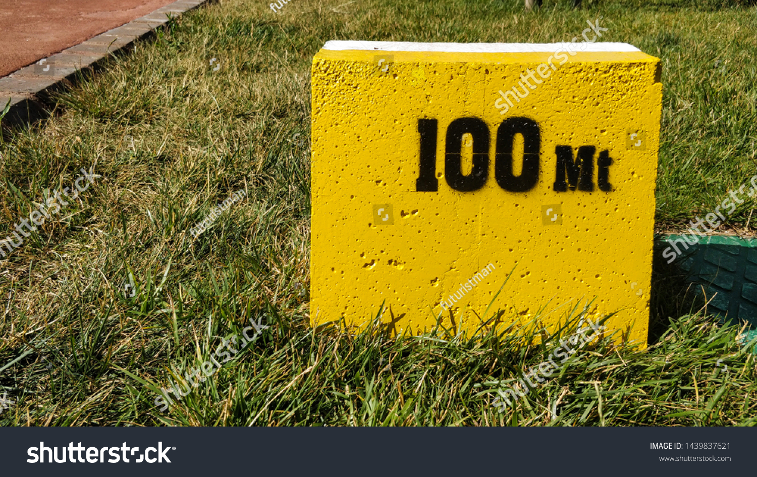 Yellow milestone showing 100 meters. #1439837621