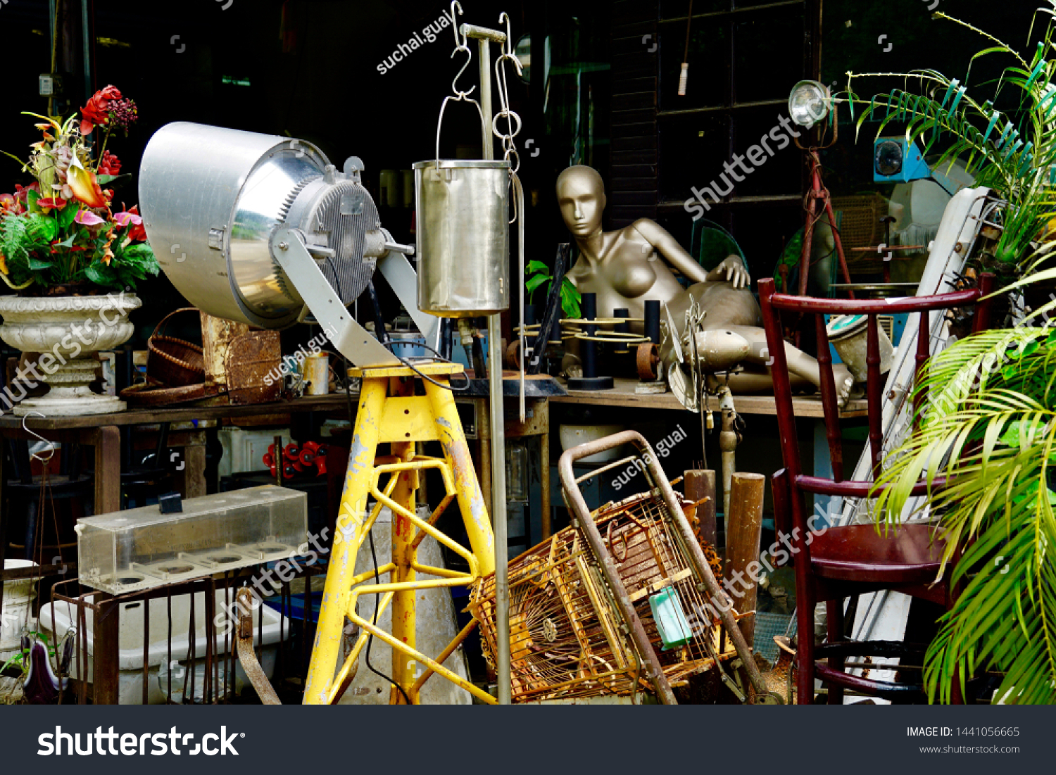 Scrap equipment. Old Equipment and tools for modeling. Materials, equipment and tools from the trade show, exhibitions and fasion event. Second hand shops and used goods are located along the road. #1441056665